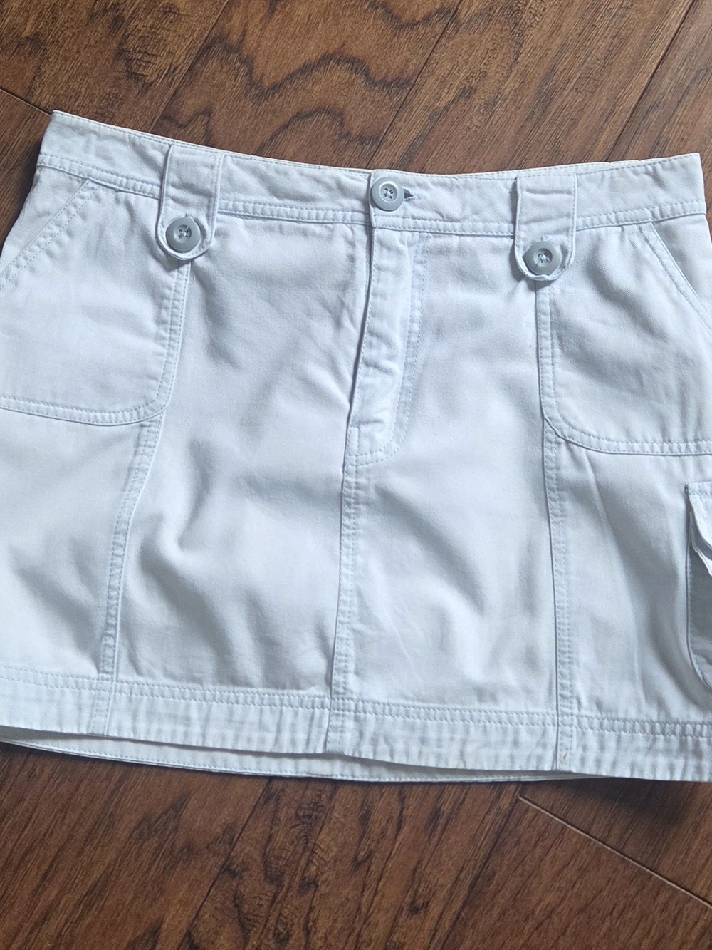 Cropped White Mini Skirt with Button-Front Detail